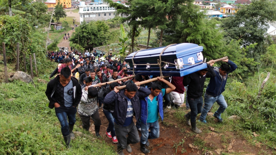 Pallbearers carry the coffin of Misael Paiz, 25, to his funeral in Aguacate, Huehuetenango, Guatemala, Oct. 29, 2018. Paiz died in the Sonoran Desert after traveling over 2,000 miles to cross the US-Mexico border. Pallbearers carry Misael Paiz's coffin.