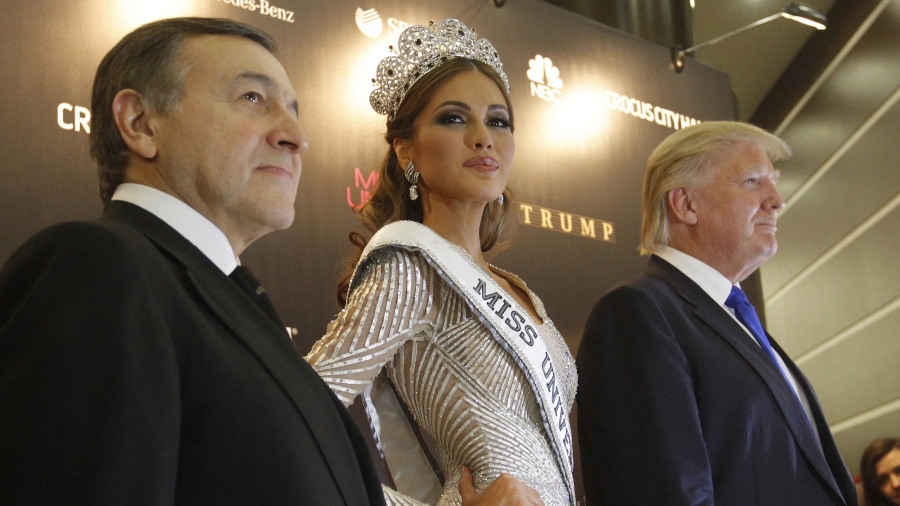 Miss Universe 2013 Gabriela Isler stands between Donald Trump, co-owner of the Miss Universe Organization, and Russian oligarch Aras Agalarov, during a news conference following the Miss Universe pageant at Crocus City Hall in Moscow on November 9, 2013. Miss Universe 2013 Gabriela Isler stands between Donald Trump, co-owner of the Miss Universe Organization, and Russian oligarch Aras Agalarov, during a news conference following the Miss Universe pageant at Crocus City Hall in Moscow on November 9, 2013.