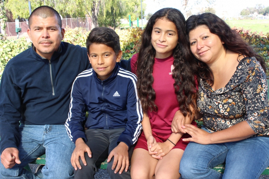 Crista Ramos sits on a park bench with dad Edgar Ramos, brother Diego and mom Cristina Morales in Richmond, California on Nov. 4, 2018. Crista Ramos sits on a park bench with dad Edgar Ramos, brother Diego and mom Cristina Morales in Richmond, California on Nov. 4, 2018.