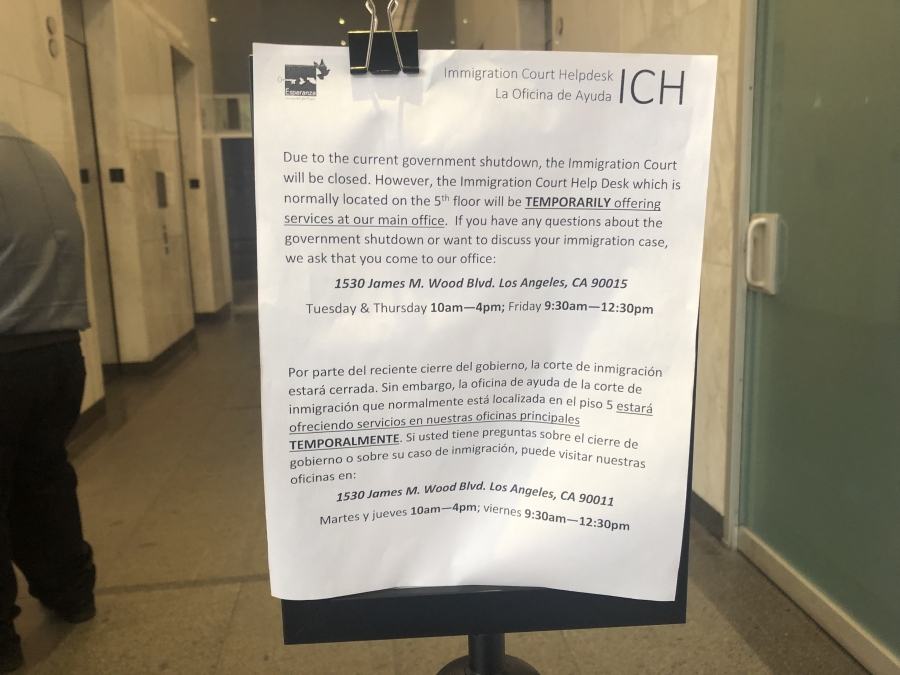 A sign in the lobby of the Los Angeles immigration court explains the court is closed due to a partial government shutdown. A sign in the lobby of the Los Angeles immigration court explains the court is closed due to a partial government shutdown.