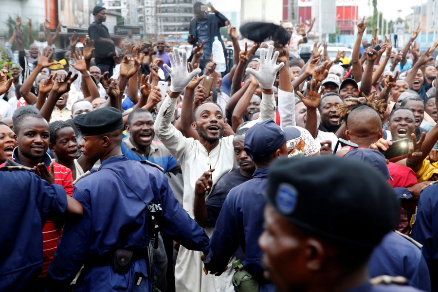 Supporters of Felix Tshisekedi celebrate in the streets of Kinshasa, Democratic Republic of Congo, Jan. 10, 2019. Supporters of Felix Tshisekedi are shown with their hands in the air celebrating in the streets of Kinshasa, Democratic Republic of Congo.