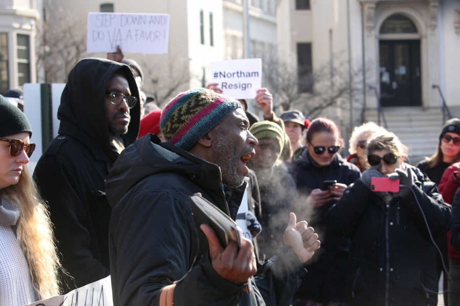 Protesters outside the Virginia Governor's mansion call for Virginia Governor Ralph Northam's resignation, Feb. 2, 2019. Protesters are shown with placards outside the Virginia Governor's mansion calling for Virginia Governor Ralph Northam's resignation.