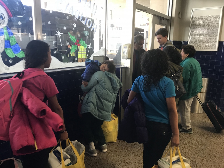 Migrants just released from detention at a Greyhound bus station in San Antonio Migrants just released from detention at a Greyhound bus station in San Antonio