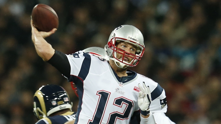 New England Patriots quarterback Tom Brady throws a pass against the St. Louis Rams in Wembley Stadium in London at one of the NFL's regular games played outside of the US, October 28, 2012. The Rams relocated back to Los Angeles in 2016. New England Patriots quarterback Tom Brady throws a pass against the St. Louis Rams in Wembley Stadium in London at one of the NFL's regular games played outside of the US, October 28, 2012. The Rams relocated back to Los Angeles in 2016.