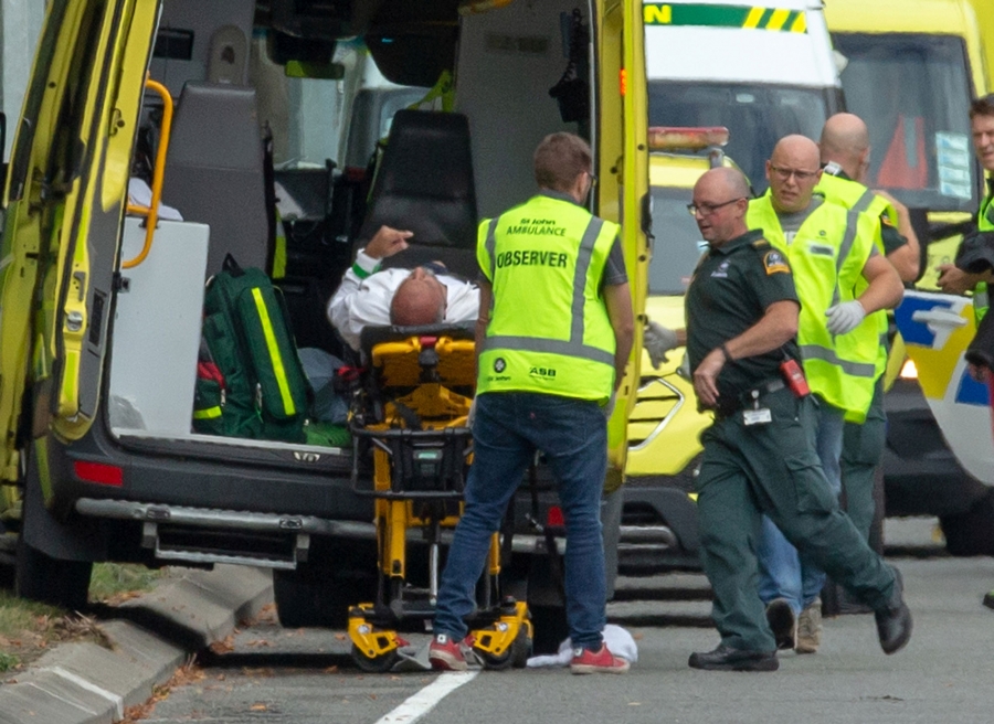 An injured person is loaded into an ambulance following a shooting at the Al Noor mosque in Christchurch, New Zealand. An injured person is shown on a medical gurney is loaded into an ambulance.