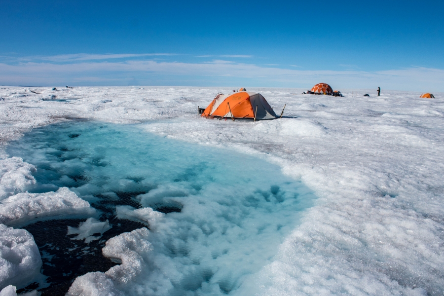Glaciologist Joel Harper's team stays in tents right on the Greenland ice sheet Glaciologist Joel Harper's team stays in tents right on the Greenland ice sheet
