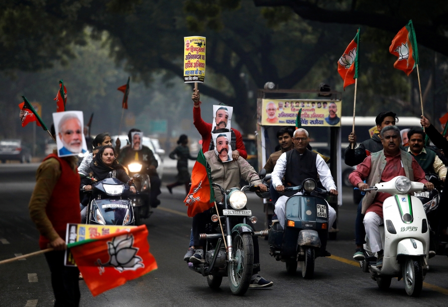 men wear masks of face of IAF pilot with mustache