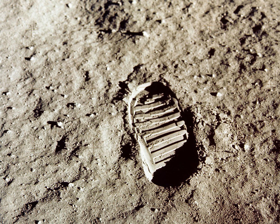 Close-up view of an Apollo 11 astronaut's footprint in the lunar soil photographed with a 70mm lunar surface camera. The oval tread of an astronaut's footprint is shown on the the lunar soil.