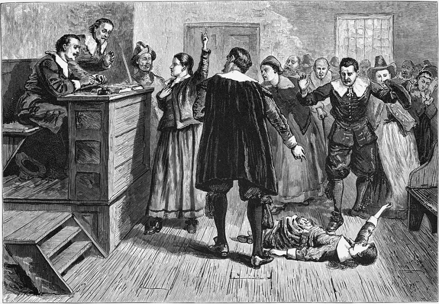 Witchcraft at Salem Village An illustration of a woman in a courtroom surrounded by men.