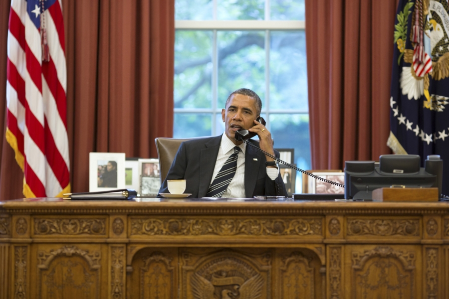 US President Barack Obama talks with Iranian President Hasan Rouhani during a phone call in the Oval Office September 27, 2013. REUTERS/Pete Souza/The White House US President Barack Obama talks with Iranian President Hasan Rouhani during a phone call in the Oval Office September 27, 2013. REUTERS/Pete Souza/The White House