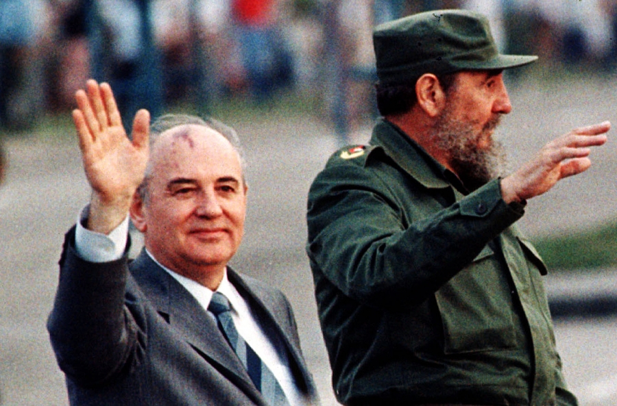 Soviet leader Mikhail Gorbachev (L) and Cuban leader Fidel Castro wave from an open top car as it drives through Havana's Revolution Square in this April 2, 1989 file photo. Soviet leader Mikhail Gorbachev (L) and Cuban leader Fidel Castro wave from an open top car as it drives through Havana's Revolution Square in this April 2, 1989 file photo.