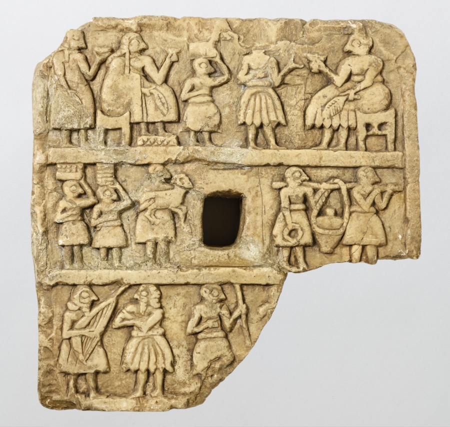 A banquet scene. Khafajeh, Iraq, (c. 2600–2350 B.C.). A banquet scene carved into stone.