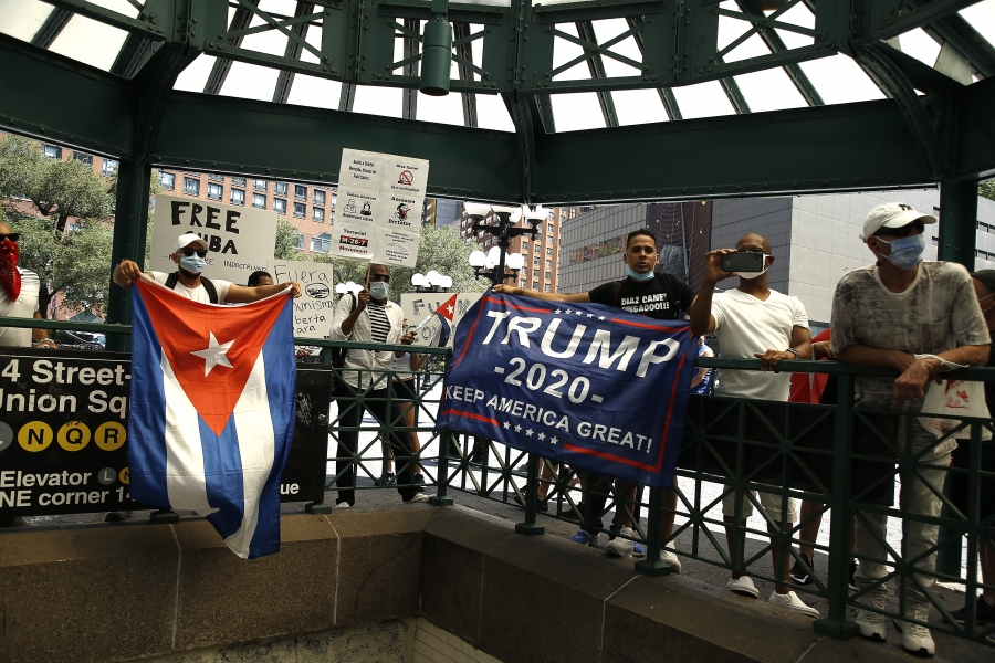 Pro-Trump Cuban Americans in the Democratic stronghold of New York City, July 26, 2020. A row of Cuban Americans holding up pro-Trump flags.