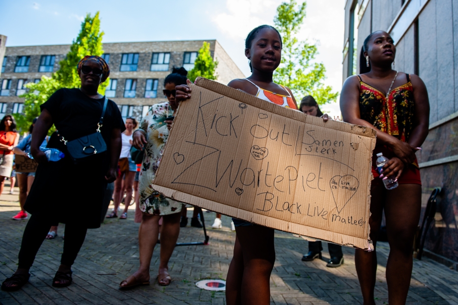 Protesters from the Kick Out Black Pete movement