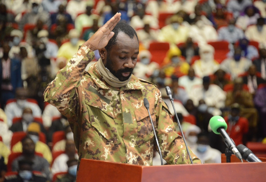 Col. Assimi Goita is sworn in as Mali’s transitional vice president following a military mutiny, Sept. 25, 2020. A man in a military uniform speaks at a podium.