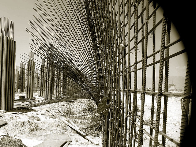 Tilted columns and sagging reinforcing rods at the Justice Center Court House construction project in Parwan Province, Afghanistan. Tilted columns and sagging reinforcing rods at the Justice Center Court House construction project in Parwan Province, Afghanistan.