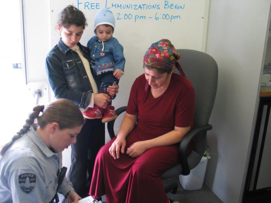 Shelli Sonnenberg with the Boise Police Department helps new arrivals in Idaho. Shelli Sonnenberg with the Boise Police Department helps new arrivals in Idaho.