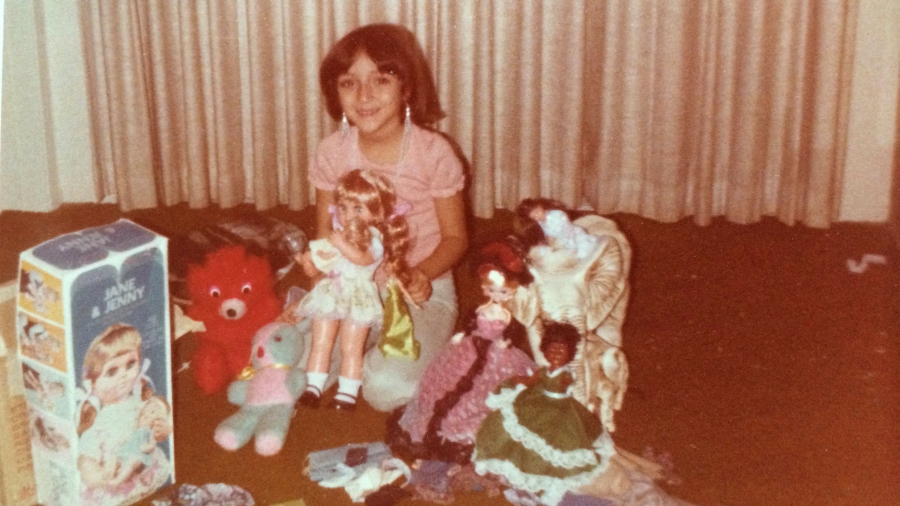 Eight-year-old Susan Cruz enjoying her first Christmas in the United States in 1978. Eight-year-old Susan Cruz enjoying her first Christmas in the United States in 1978.
