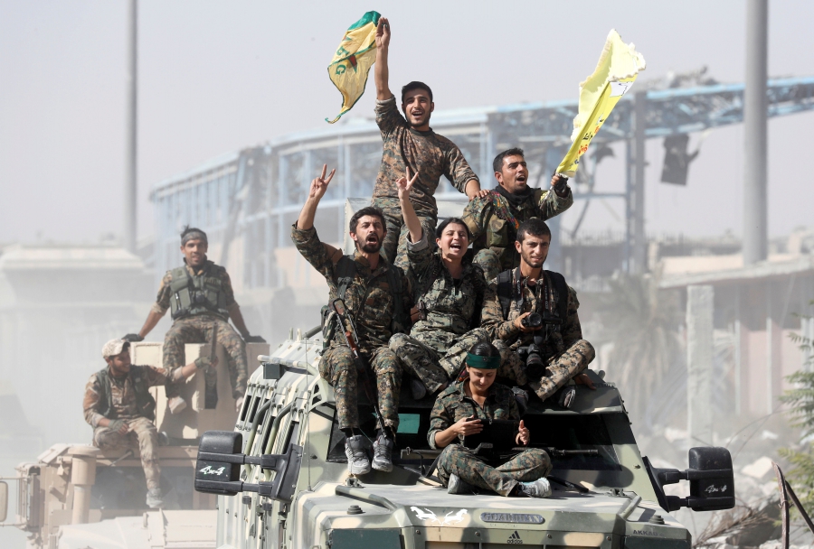 Syrian Democratic Forces (SDF) celebrate the defeat of ISIS in Raqqa, Syria. Syrian Democratic Forces (SDF) celebrate the defeat of ISIS in Raqqa, Syria.