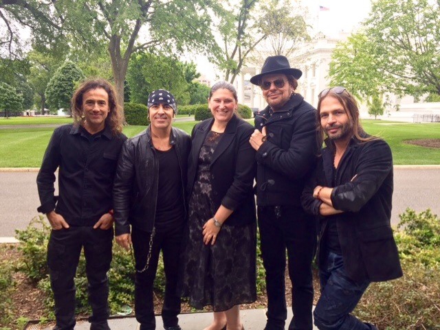 Gabriela Chojkier, Senior Director of Hispanic Media at the White House, poses with Latin rock band Mana Gabriela Chojkier, Senior Director of Hispanic Media at the White House, poses with Latin rock band Mana