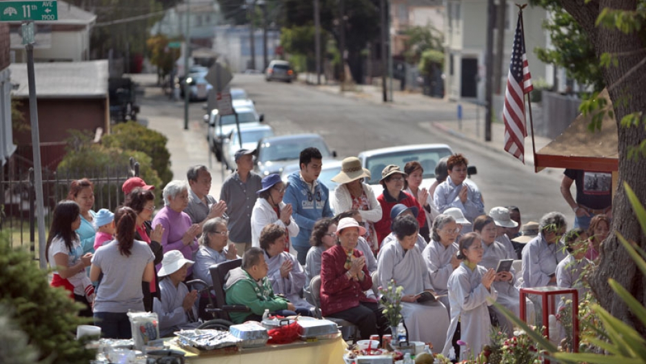 For years, only a piece of scrap metal covered the Buddha, but in July some Vietnamese immigrants in Oakland upgraded the shrine. Here, Vietnamese immigrants celebrate a Buddhist holiday with a special ceremony in the Oakland neighborhood. For years, only a piece of scrap metal covered the Buddha, but in July some Vietnamese immigrants in Oakland upgraded the shrine. Here, Vietnamese immigrants celebrate a Buddhist holiday with a special ceremony in the Oakland neighborhood.