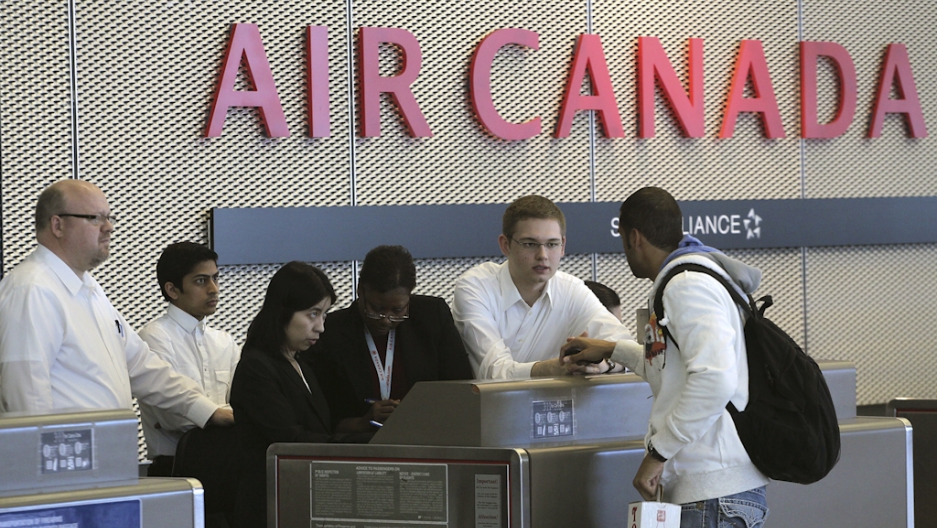 air canada warns of delays as customer service staff go on strike