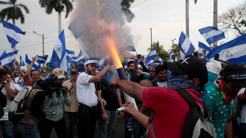 A demonstrator fires a homemade mortar during protest march against Nicaraguan President Daniel Ortega's government in Managua, May 9, 2018. A demonstrator fires a homemade mortar during protest march against Nicaraguan President Daniel Ortega's government in Managua, May 9, 2018.