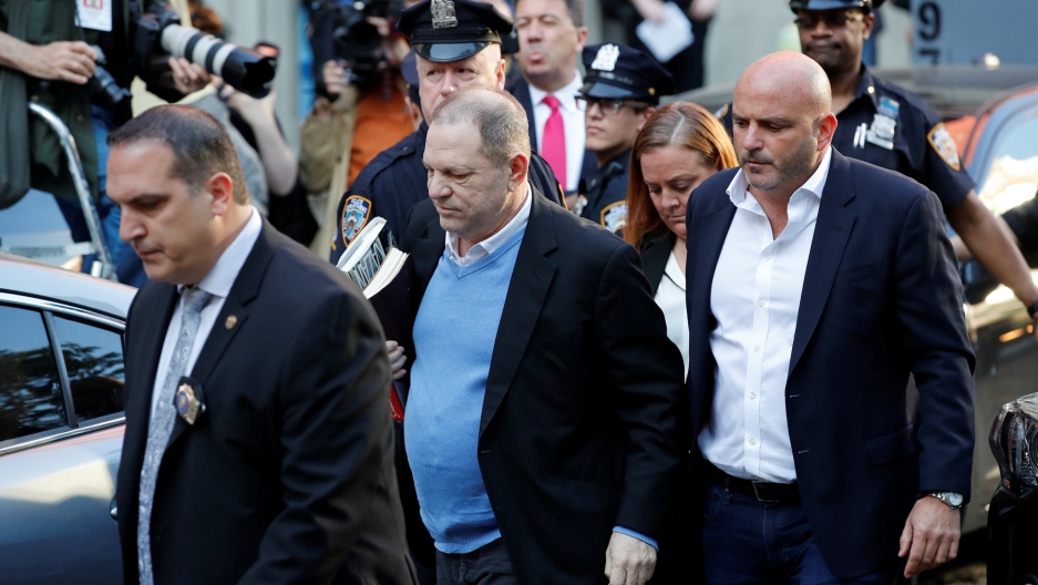 Film producer Harvey Weinstein arrives at the 1st Precinct in Manhattan, May 25, 2018. Film producer Harvey Weinstein, surrounded by NYC authorities, arrives at the 1st Precinct in Manhattan.