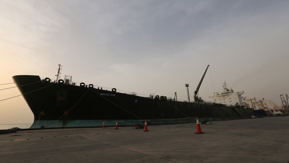 A cargo ship unloads a shipment of fuel at the Hodeida port, May 27, 2018. A cargo ship unloads a shipment of fuel at the Hodeida port, May 27, 2018.