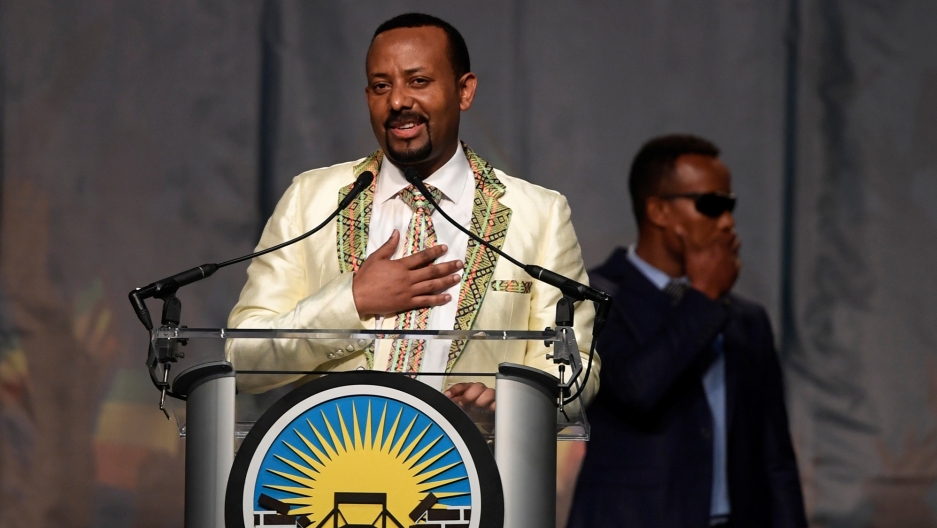 Ethiopian Prime Minister Abiy Ahmed speaks in Washington DC, July 28, 2018. Ethiopian Prime Minister Abiy Ahmed stands at a podium with his hand on his heart as he speaks in Washington DC, July 28, 2018.