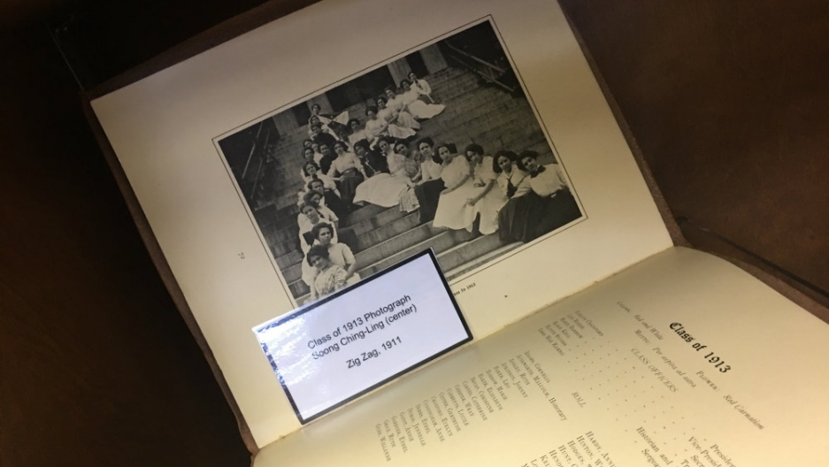 Black and white photo of Wesleyan College students in the early 1900s. The students form the letter K on the steps of a building.