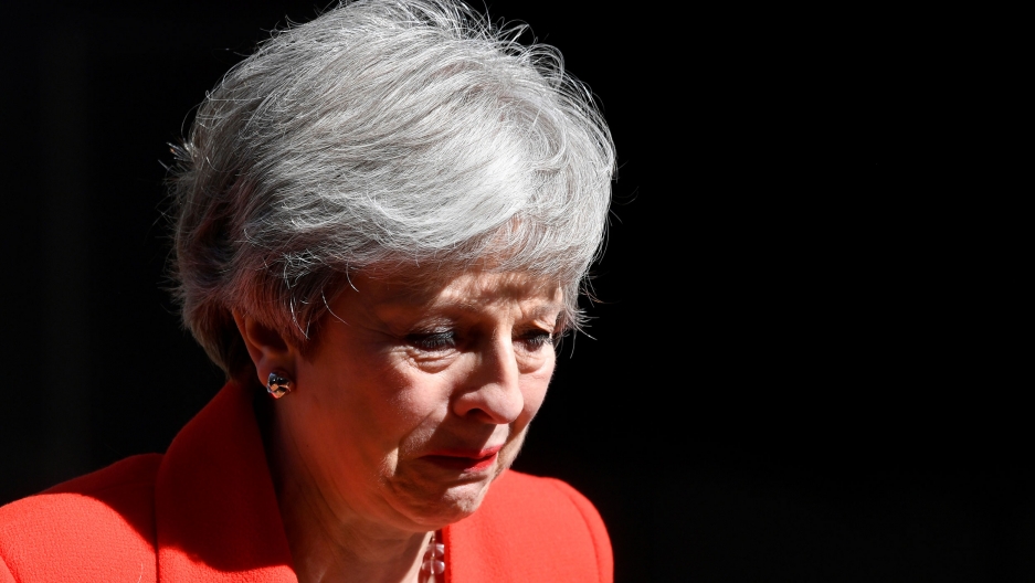 British Prime Minister Theresa May reacts as she delivers a statement announcing her resignation in London, Britain. A close-up photograph of British Prime Minister Theresa May is shown with an emotional reaction.