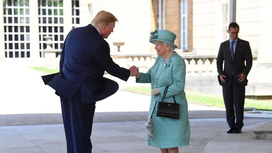 Britain's Queen Elizabeth II greets US President Donald Trump as he arrives for the Ceremonial Welcome at Buckingham Palace, in London, Britain, June 3, 2019. Britain's Queen Elizabeth II greets US President Donald Trump are shown facing each other shaking hands.