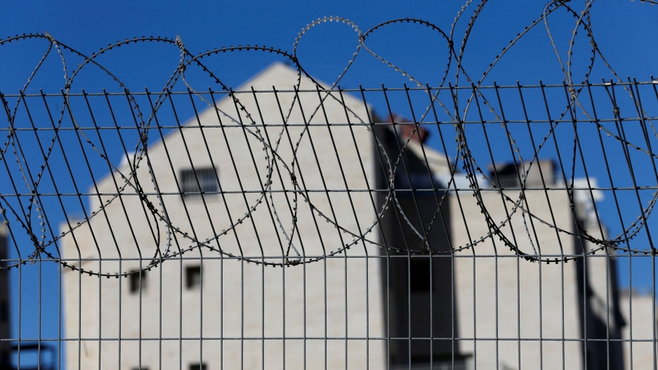 A fence is seen at the Jewish settlement of Kiryat Arba in Hebron, in the Israeli-occupied West Bank, on Nov. 19, 2019. A fence is seen at the Jewish settlement of Kiryat Arba in Hebron, in the Israeli-occupied West Bank.