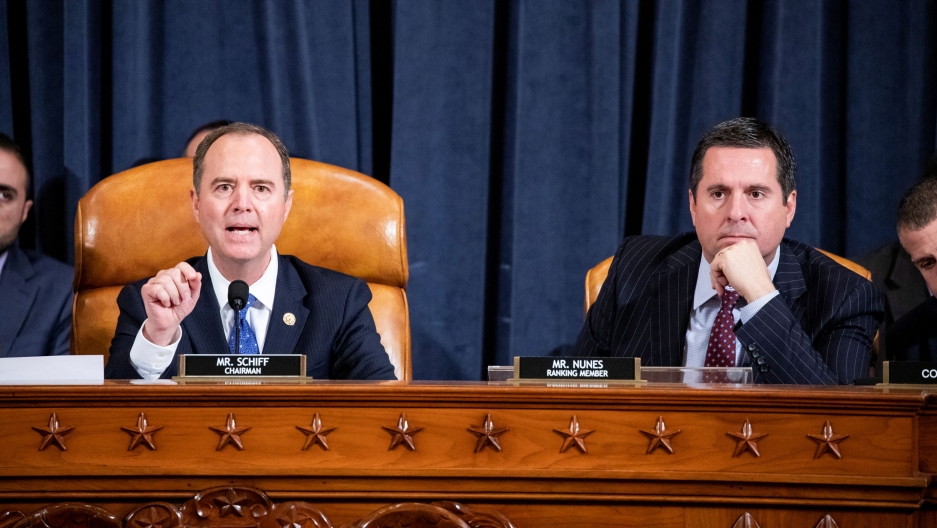 House Intelligence Committee Chairman Adam Schiff (D-CA) gives his closing remarks while House Intelligence Committee Ranking Member Devin Nunes (R-CA) listens after Gordon Sondland, US Ambassador to the European Union, testified. House Intelligence Committee Chairman Adam Schiff (D-CA) gives his closing remarks while House Intelligence Committee Ranking Member Devin Nunes (R-CA) listens.