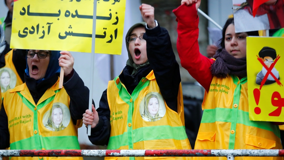 People attend a protest organized by National Council of Resistance of Iran in Germany to support nationwide demonstrations in Iran against the rise in gasoline prices, in Berlin, Germany. People attend a protest organized by National Council of Resistance of Iran in Germany to support nationwide demonstrations in Iran against the rise in gasoline prices, in Berlin, Germany.