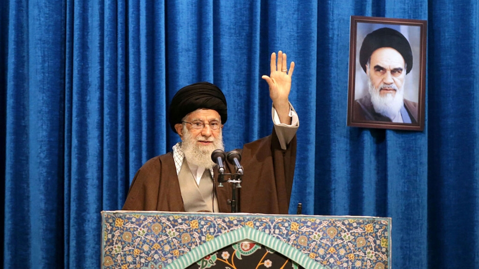 Iran's Supreme Leader Ayatollah Ali Khamenei gestures as he delivers a Friday prayers sermon, in Tehran, Iran, Jan. 17, 2020. Iran's Supreme Leader Ayatollah Ali Khamenei his shown standing at a podium with his hand raised.