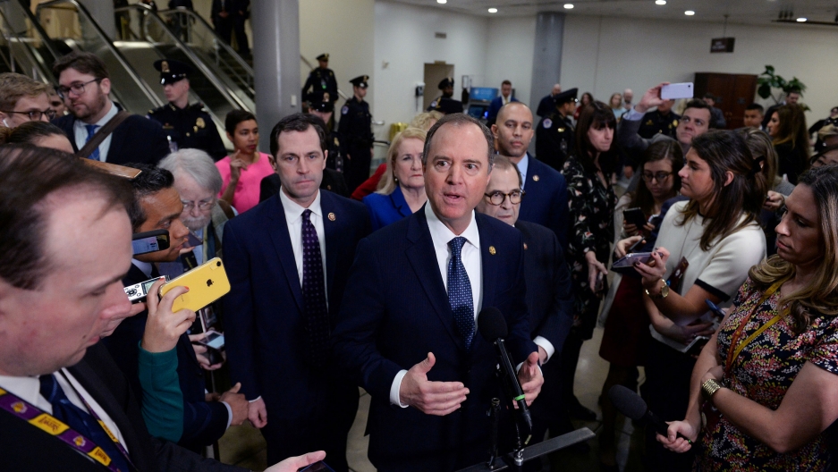 House Managers Rep. Adam Schiff speaks next to Rep. Jerry Nadler during a news conference near the Senate Subway to discuss the Senate impeachment trial of President Donald Trump in Washington, DC, Jan. 22, 2020. House Managers Rep. Adam Schiff is shown wearing a blue suit and tie while surrounded by reporters holding phones and other recording devices.
