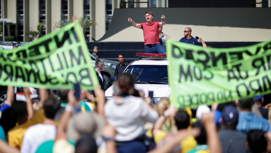 Protesters rally against coronavirus protective measures