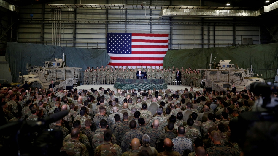 US President Donald Trump delivers remarks to US troops during an unannounced visit to Bagram Air Base, Afghanistan on November 28, 2019. US President Donald Trump delivers remarks to US troops during an unannounced visit to Bagram Air Base, Afghanistan on November 28, 2019.