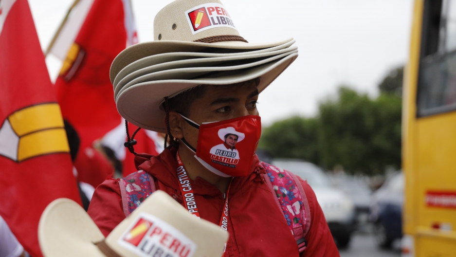 A vendor sells hats at the closing campaign rally for Free Peru party presidential candidate Pedro Castillo in Lima, Peru, Thursday, June 3, 2021. The former rural school teacher will face rival candidate Keiko Fujimori in a June 6 election. A vendor sells hats at the closing campaign rally for Free Peru party presidential candidate Pedro Castillo in Lima, Peru, Thursday, June 3, 2021. The former rural school teacher will face rival candidate Keiko Fujimori in a June 6 election.