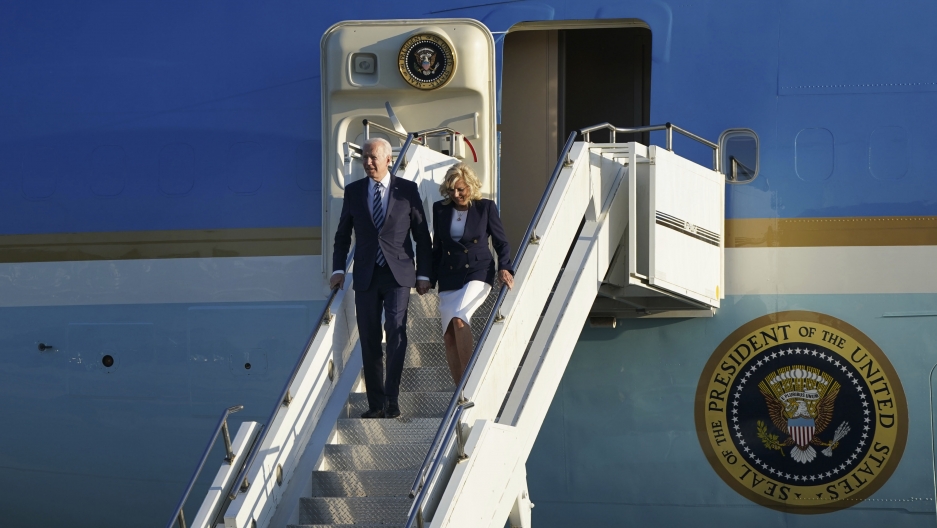 US President Joe Biden and First Lady Jill Biden arrive aboard Air Force One at RAF Mildenhall, England, ahead of the G-7 summit in Cornwall, Wednesday June 9, 2021. US President Joe Biden and First Lady Jill Biden arrive aboard Air Force One at RAF Mildenhall, England, ahead of the G-7 summit in Cornwall, Wednesday June 9, 2021.