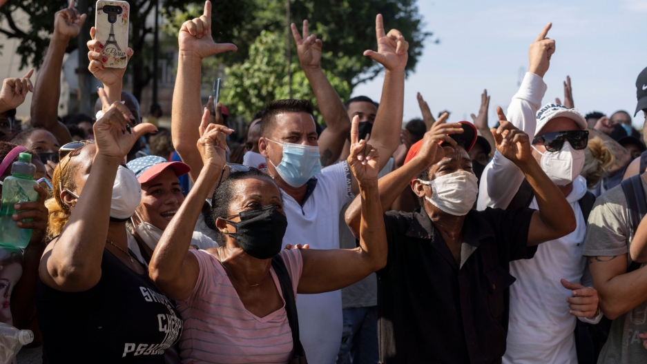 Anti-government protesters march in Havana, Cuba, Sunday, July 11, 2021. Anti-government protesters march in Havana, Cuba, Sunday, July 11, 2021.