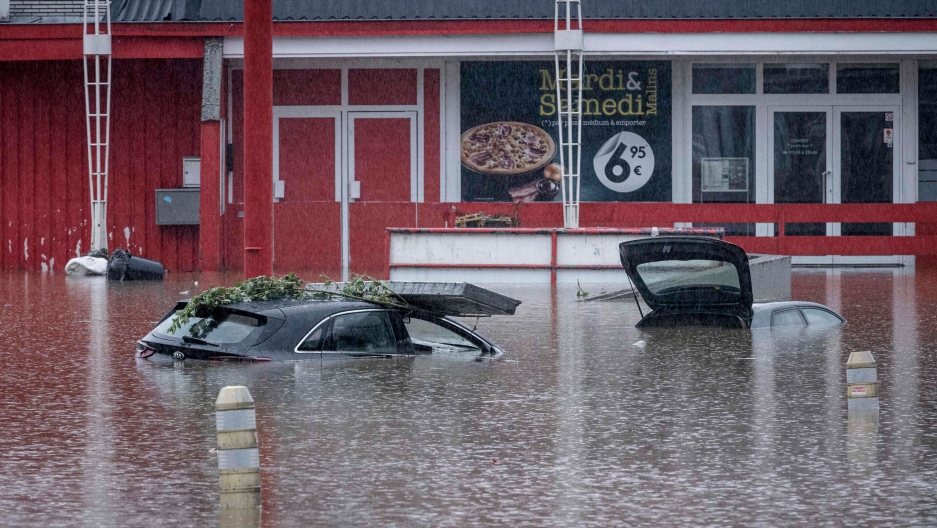Cars are submerged in water after the Meuse River broke its banks during heavy flooding in Liege, Belgium, Thursday, July 15, 2021. Cars are submerged in water after the Meuse River broke its banks during heavy flooding in Liege, Belgium, Thursday, July 15, 2021.