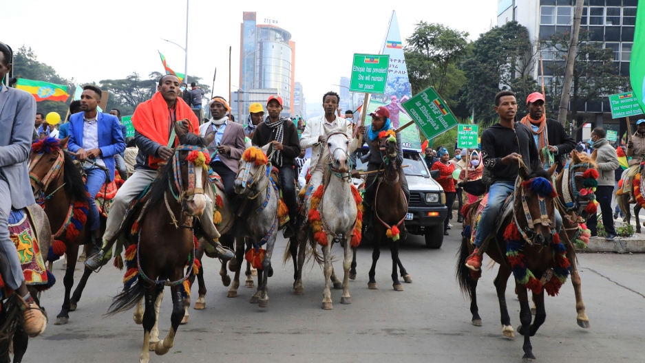 In this Sunday, Aug. 8, 2021, file photo, thousands of Ethiopians from the capital and surrounding areas head to Meskel Square to rally against the Tigray People's Liberation Front (TPLF). In this Sunday, Aug. 8, 2021, file photo, thousands of Ethiopians from the capital and surrounding areas head to Meskel Square to rally against the Tigray People's Liberation Front (TPLF).