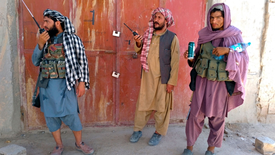 Taliban fighters stand guard at a checkpoint inside the city of Farah, capital of Farah province, southwest Afghanistan, Wednesday, Aug. 11, 2021. Taliban fighters stand guard at a checkpoint inside the city of Farah, capital of Farah province, southwest Afghanistan, Wednesday, Aug. 11, 2021.