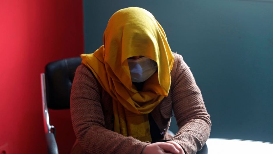 A female TV presenter from southern Afghanistan hides her identity for security concerns as she gives an interview to The Associated Press in Kabul, Afghanistan, Wednesday, Feb. 3, 2021. A female TV presenter from southern Afghanistan hides her identity for security concerns as she gives an interview to The Associated Press in Kabul, Afghanistan, Wednesday, Feb. 3, 2021.