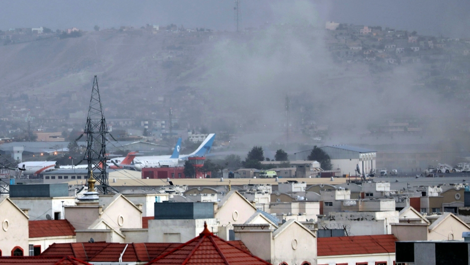 Smoke rises from a deadly explosion outside the airport in Kabul, Afghanistan, Thursday, Aug. 26, 2021. Smoke rises from a deadly explosion outside the airport in Kabul, Afghanistan, Thursday, Aug. 26, 2021.
