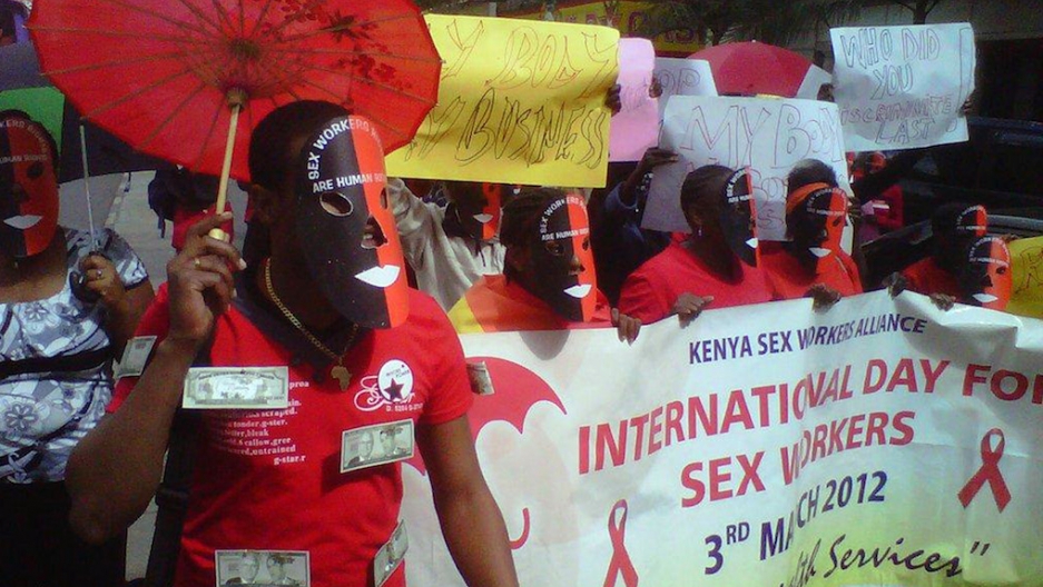 Kenyan Sex Workers March To Protest For The Legalization Of Prostitution On March 6 2012 In Nairobi Under Red Umbrellas And In Red T Shirts Kenyan Sex Workers March To Protest For The Legalization Of Prostitution On March 6 2012 In Nairobi Under Red Umbrellas And In Red T Shirts