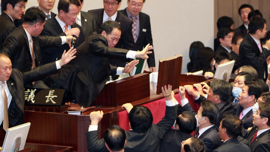 South Koreas Opposition Party Lawmakers Protest At The Chairmans Seat Inside The National Assembly In Seoul To Try To Stop The Ruling Grand National South Koreas Opposition Party Lawmakers Protest At The Chairmans Seat Inside The National Assembly In Seoul To Try To Stop The Ruling Grand National